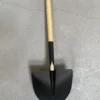 Arrière de la pelle en bois et acier